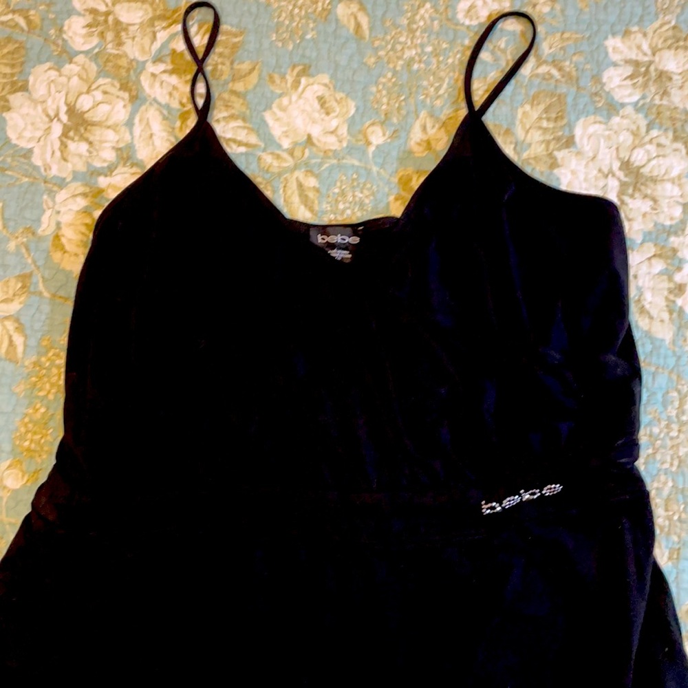BeBe  jumpsuit size large.